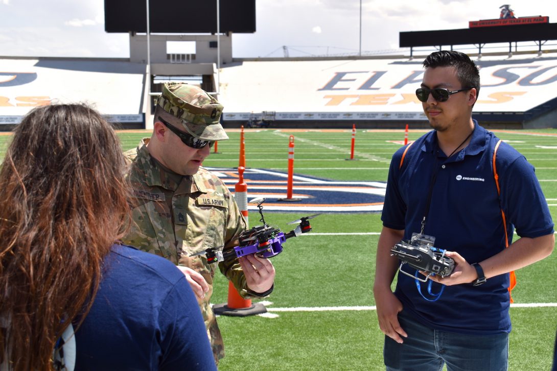 engineering team working with drones