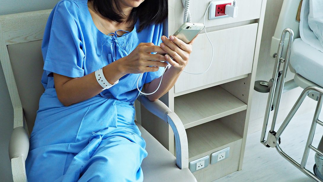 patient holding phone